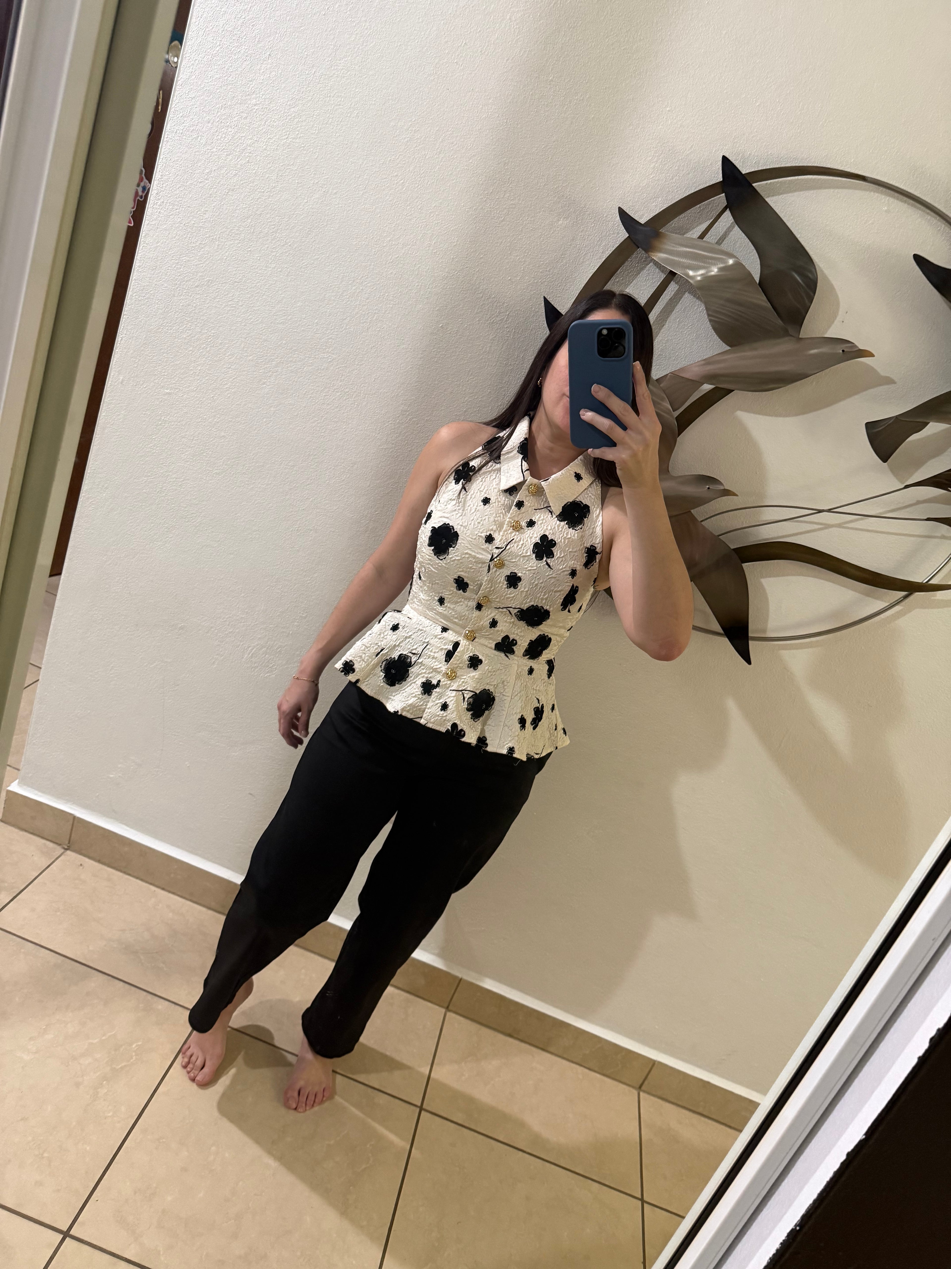 Peplum Ivory and black top